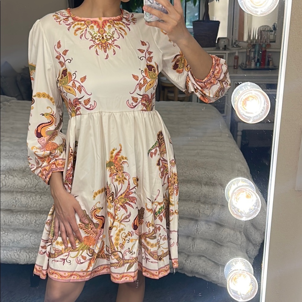 Elegant White and Orange Printed Dress used in great condition